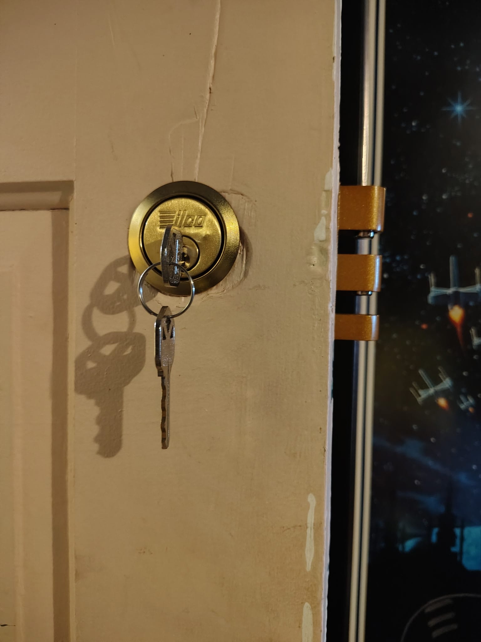 Freshly cut brass keys for residential deadbolt